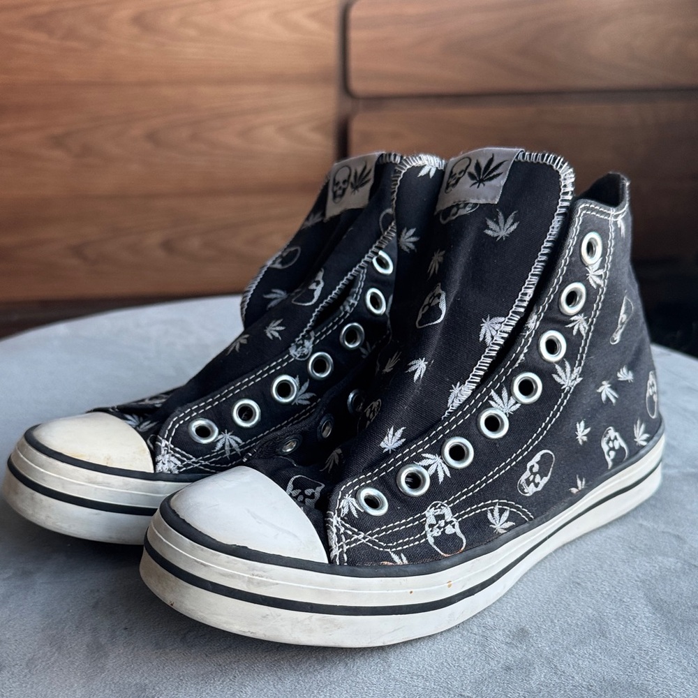 Black High-Top Sneakers with Skull and Leaf Design